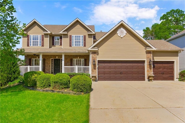 8912 NE 97th St, Kansas City, MO 64157 - craftsman-style house with driveway, covered porch, a front yard, and a garage
