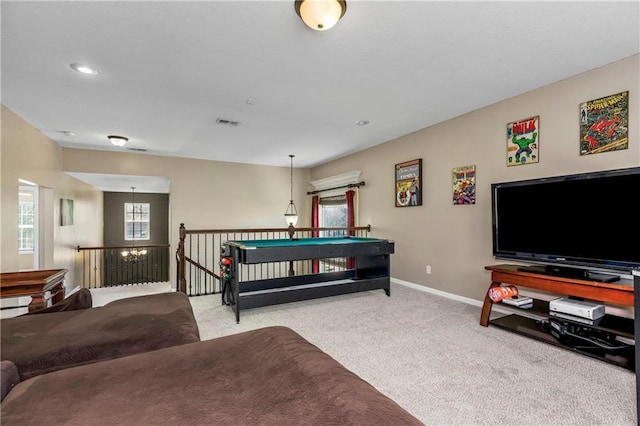 8912 NE 97th St, Kansas City, MO 64157 - recreation room with baseboards, visible vents, carpet floors, and a healthy amount of sunlight