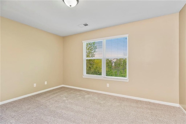 8912 NE 97th St, Kansas City, MO 64157 - empty room with baseboards, visible vents, and carpet floors