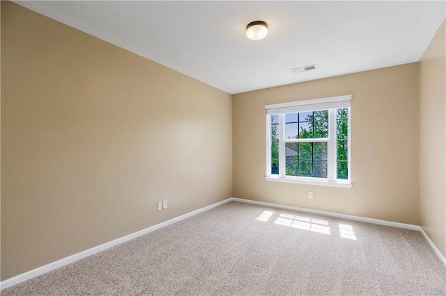 8912 NE 97th St, Kansas City, MO 64157 - spare room with carpet floors, visible vents, and baseboards