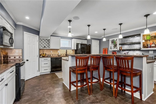 8912 NE 97th St, Kansas City, MO 64157 - kitchen with a kitchen breakfast bar, tasteful backsplash, black appliances, and crown molding