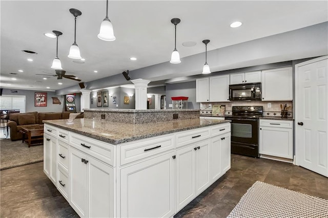 8912 NE 97th St, Kansas City, MO 64157 - kitchen with open floor plan, recessed lighting, ornate columns, ceiling fan, and black appliances