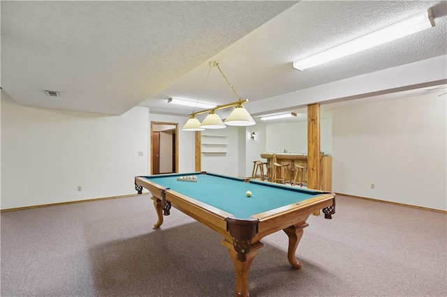 recreation room with baseboards, carpet, bar, and pool table