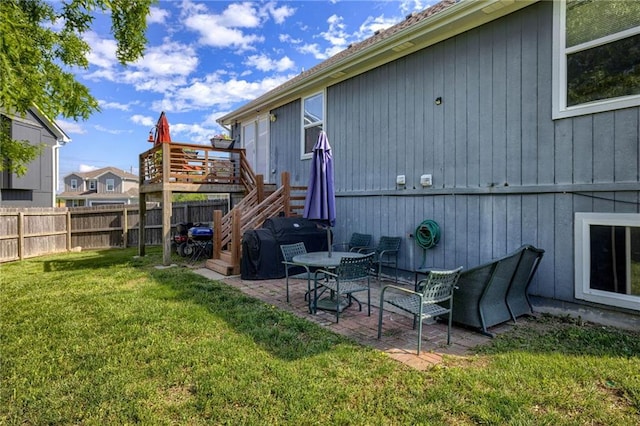back of house with a patio