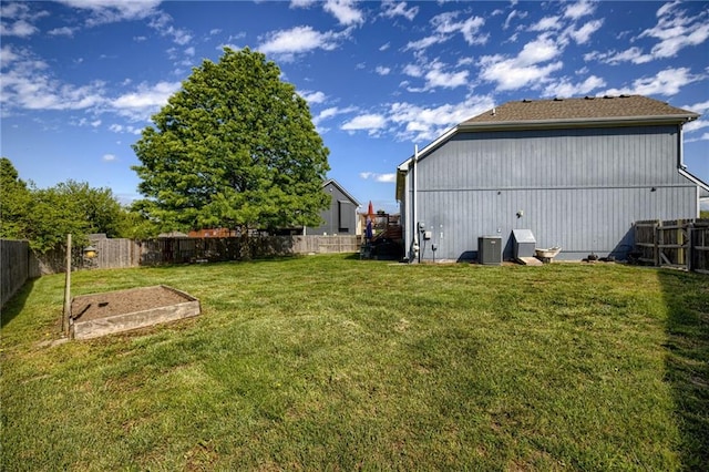 view of yard featuring central AC
