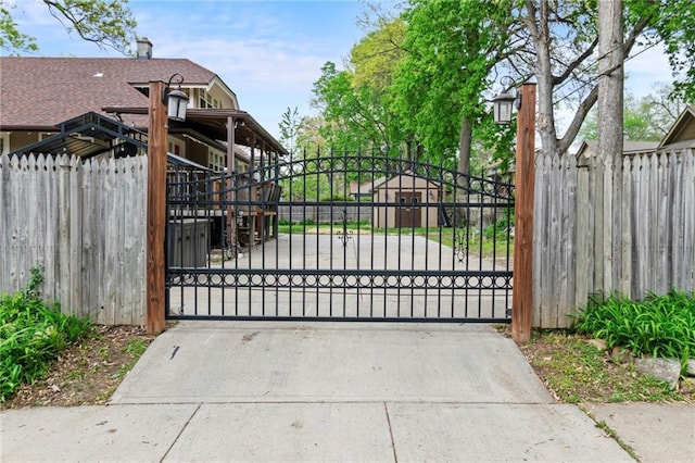 5547 Rockhill Rd, Kansas City, MO 64110 - view of gate with fence