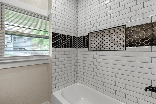 5547 Rockhill Rd, Kansas City, MO 64110 - bathroom featuring washtub / shower combination