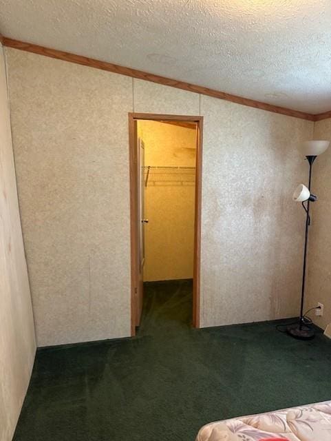4323 NW County Road 17402nd St, Adrian, MO 64720 - unfurnished bedroom featuring ornamental molding, carpet floors, and a textured ceiling