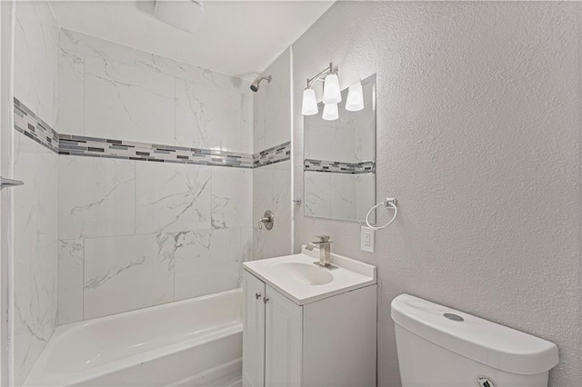709 W 28th St N, Independence, MO 64050 - full bath with a textured wall, toilet, vanity, and shower / washtub combination
