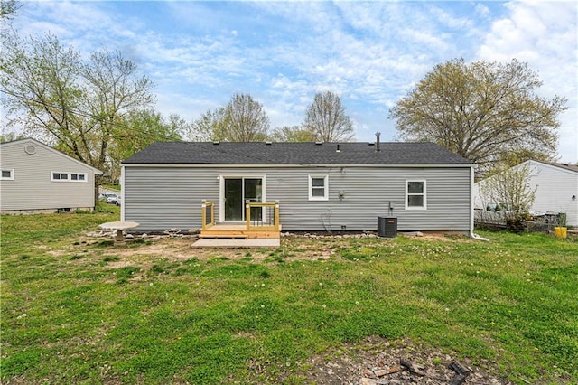 709 W 28th St N, Independence, MO 64050 - rear view of house with a lawn, central air condition unit, and a deck