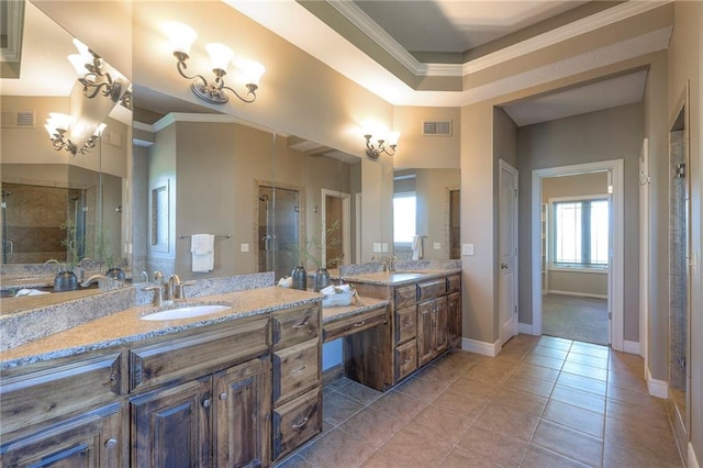 18670 W 248th St, Paola, KS 66071 - full bathroom featuring vanity, tile patterned floors, crown molding, a chandelier, and baseboards