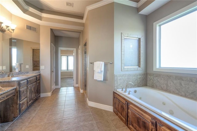 18670 W 248th St, Paola, KS 66071 - bathroom featuring a tub with jets, crown molding, tile patterned flooring, baseboards, and vanity