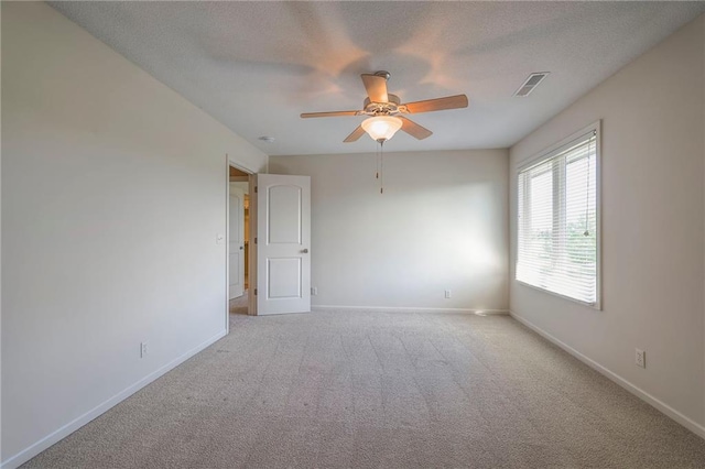 18670 W 248th St, Paola, KS 66071 - unfurnished room with a ceiling fan, carpet floors, baseboards, and a textured ceiling