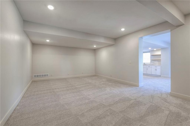 18670 W 248th St, Paola, KS 66071 - empty room with light carpet, recessed lighting, and baseboards
