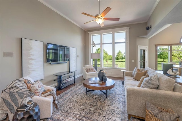 18670 W 248th St, Paola, KS 66071 - living room with ceiling fan, wood finished floors, ornamental molding, baseboards, and high vaulted ceiling