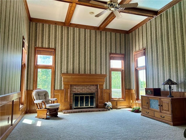 2317 Rhonda Rd, Excelsior Springs, MO 64024 - sitting room featuring coffered ceiling, plenty of natural light, beam ceiling, ceiling fan, and wainscoting