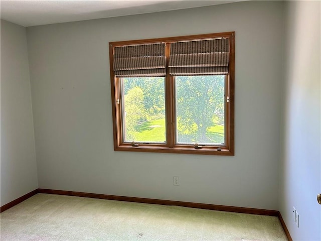 2317 Rhonda Rd, Excelsior Springs, MO 64024 - carpeted empty room featuring baseboards