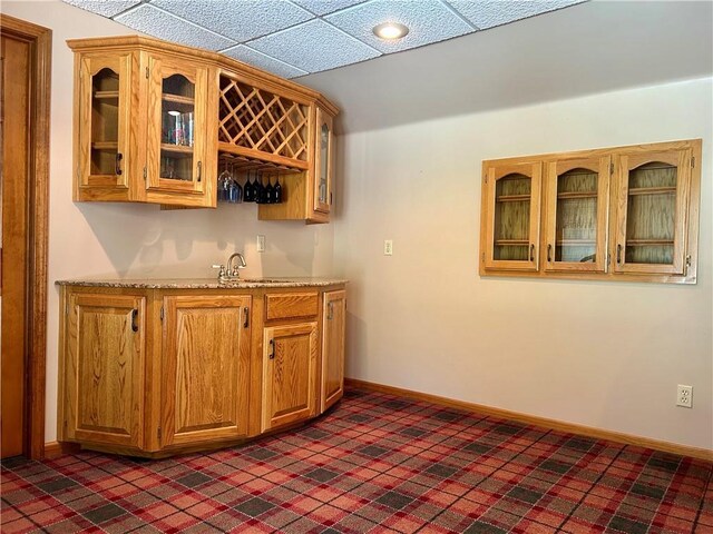 2317 Rhonda Rd, Excelsior Springs, MO 64024 - indoor wet bar with baseboards and a paneled ceiling