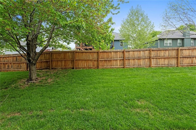 view of yard with fence