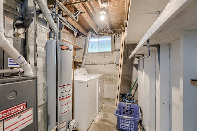 utilities featuring gas water heater and separate washer and dryer