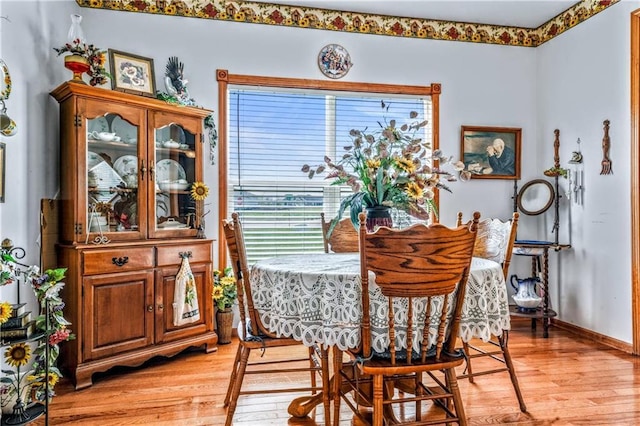 30994 W 98th St, De Soto, KS 66018 - dining area featuring light wood-style floors and baseboards