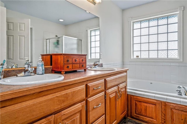 30994 W 98th St, De Soto, KS 66018 - bathroom with a shower stall, double vanity, and a garden tub