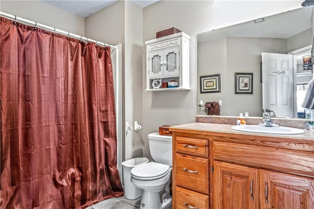 30994 W 98th St, De Soto, KS 66018 - full bathroom featuring toilet, vanity, tile patterned flooring, and curtained shower