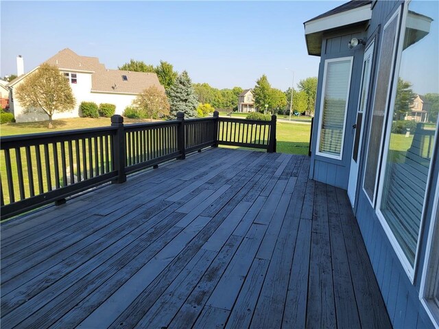 30994 W 98th St, De Soto, KS 66018 - wooden deck featuring a lawn