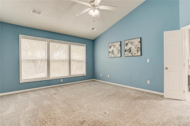 14095 S Mullen St, Olathe, KS 66062 - unfurnished room with visible vents, ceiling fan, vaulted ceiling, and carpet