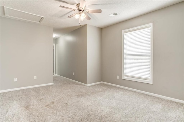 14095 S Mullen St, Olathe, KS 66062 - unfurnished room featuring a textured ceiling, visible vents, ceiling fan, baseboards, and carpet floors