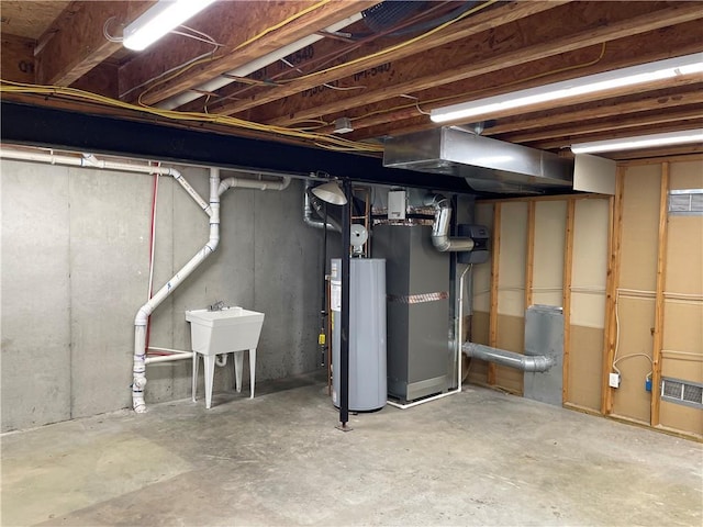 14095 S Mullen St, Olathe, KS 66062 - unfinished below grade area featuring visible vents, heating unit, and gas water heater