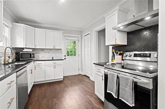 5518 Virginia Ave, Kansas City, MO 64110 - kitchen with appliances with stainless steel finishes, a sink, backsplash, and extractor fan
