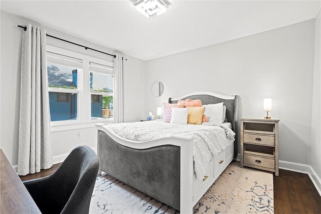 5518 Virginia Ave, Kansas City, MO 64110 - bedroom featuring light wood-style floors and baseboards