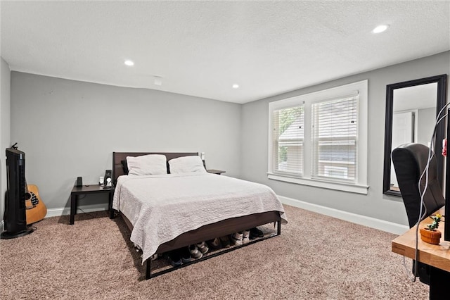 5518 Virginia Ave, Kansas City, MO 64110 - carpeted bedroom featuring baseboards, recessed lighting, and a textured ceiling