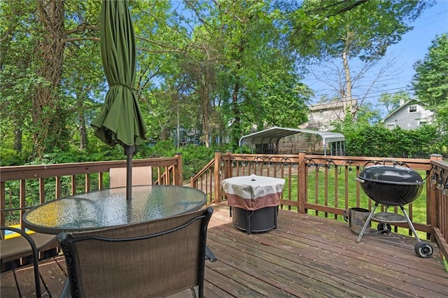 5518 Virginia Ave, Kansas City, MO 64110 - deck featuring outdoor dining area