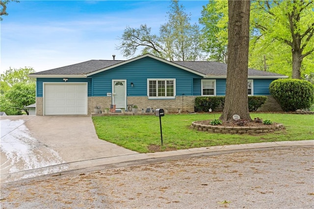 single story home with brick siding, a garage, a front lawn, and driveway