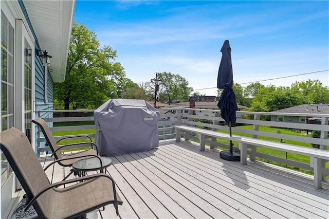 wooden terrace with grilling area
