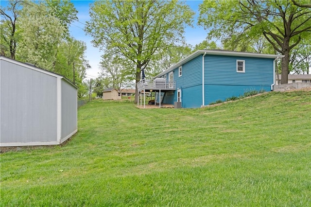 view of yard featuring a wooden deck