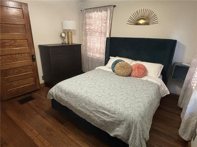 4019 Holly St, Kansas City, MO 64111 - bedroom with wood finished floors