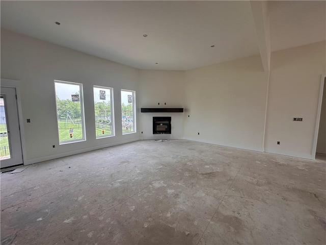 2211 Prairie Creek Dr, Kearney, MO 64060 - unfurnished living room with a glass covered fireplace