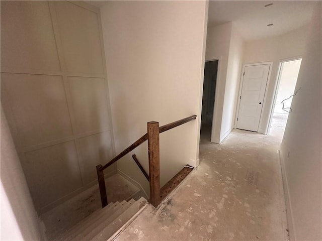 2211 Prairie Creek Dr, Kearney, MO 64060 - stairs featuring baseboards