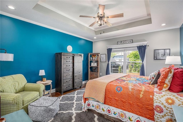 5320 N 101st Ter, Kansas City, KS 66109 - bedroom featuring a tray ceiling, crown molding, recessed lighting, baseboards, and ceiling fan