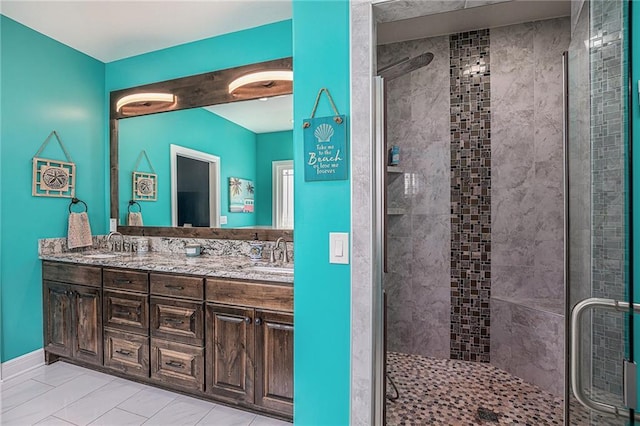5320 N 101st Ter, Kansas City, KS 66109 - bathroom with a shower stall, double vanity, and tile patterned floors