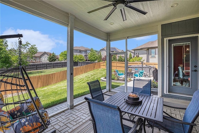 5320 N 101st Ter, Kansas City, KS 66109 - sunroom / solarium featuring a ceiling fan, a residential view, and outdoor dining area