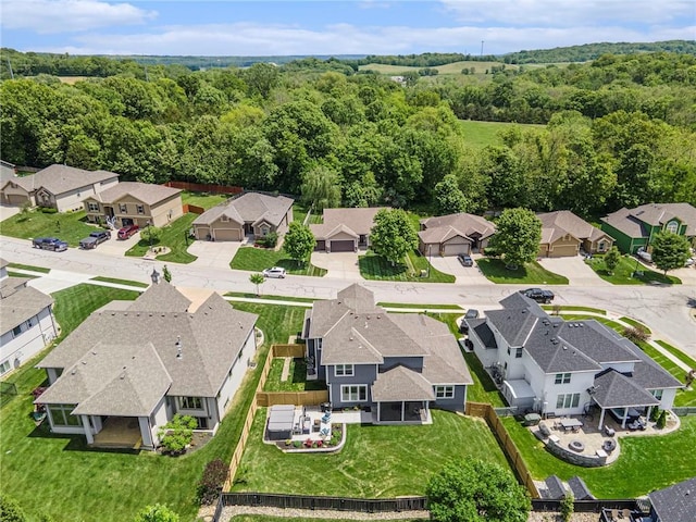 5320 N 101st Ter, Kansas City, KS 66109 - aerial perspective of suburban area with a heavily wooded area