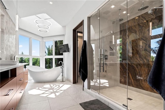 10712 W 165th St, Overland Park, KS 66221 - bathroom featuring a shower stall, a freestanding bath, vanity, and tile patterned flooring