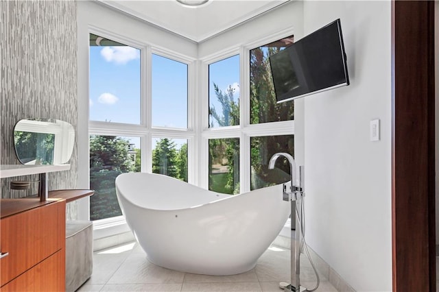 10712 W 165th St, Overland Park, KS 66221 - full bathroom featuring a freestanding tub, tile patterned flooring, and baseboards