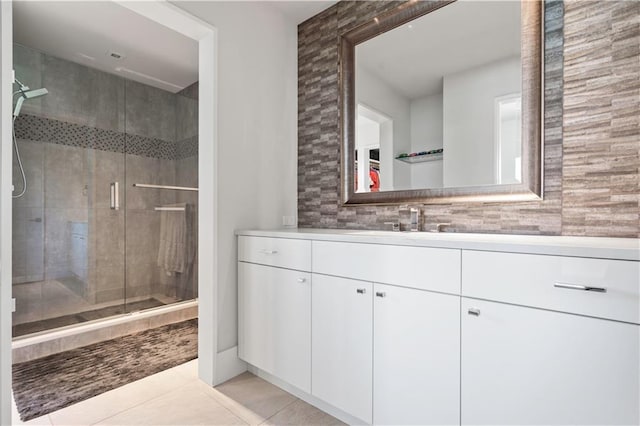 10712 W 165th St, Overland Park, KS 66221 - bathroom featuring vanity, a shower stall, and tile patterned flooring