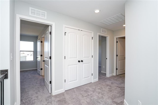 18256 W 166th St, Olathe, KS 66062 - hall featuring light carpet and baseboards