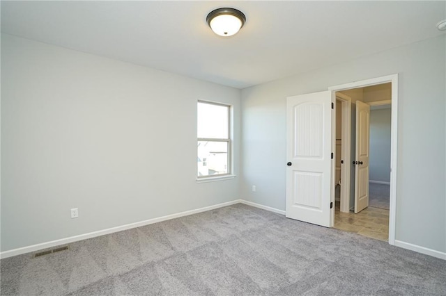 18256 W 166th St, Olathe, KS 66062 - unfurnished bedroom with carpet flooring and baseboards